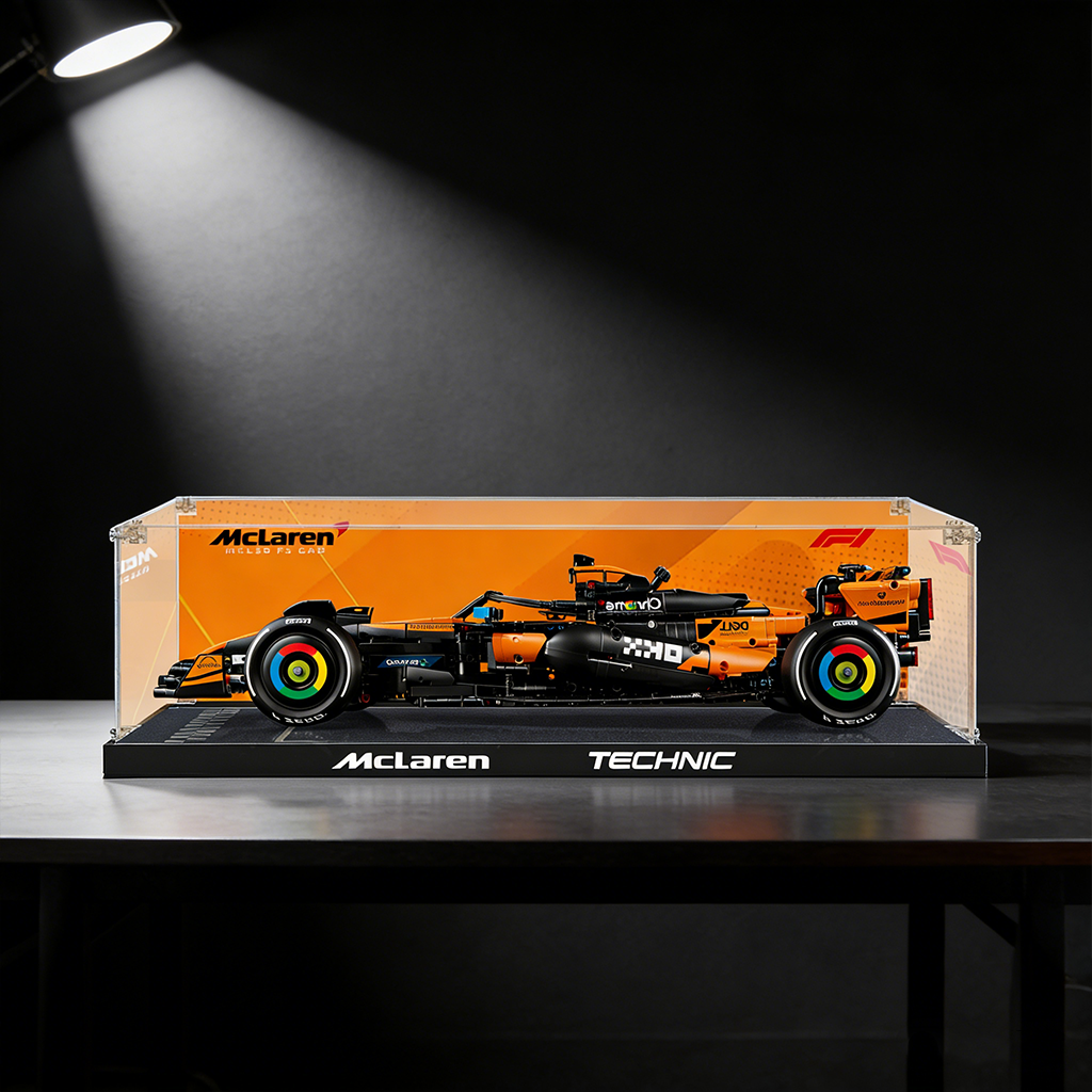 LEGO McLaren F1 car displayed in a clear acrylic wall display case with black base