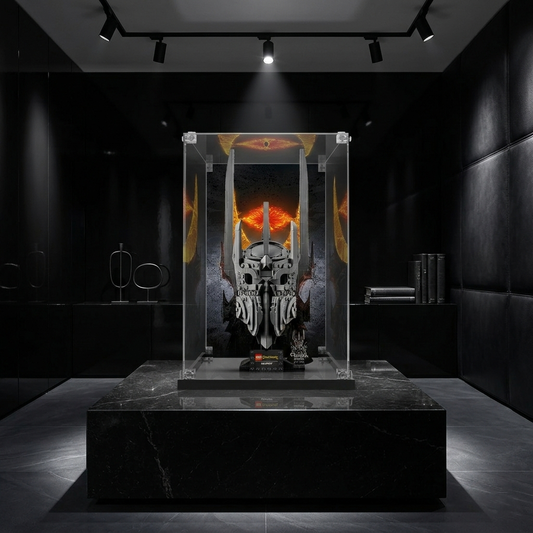 A LEGO helmet collectible displayed in a clear acrylic case with a dramatic dark room background.