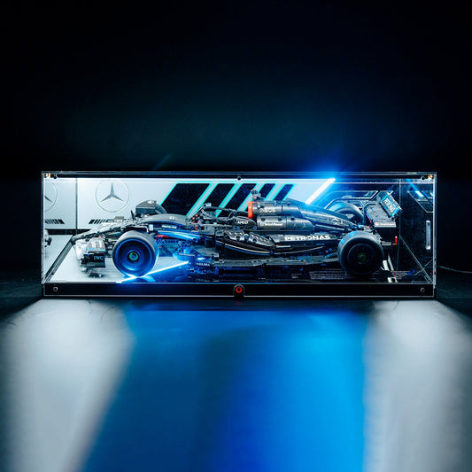 LED-lit wall display case showcasing a LEGO Formula 1 car collectible model in a clear acrylic frame